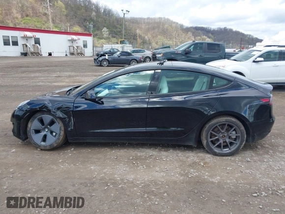 2021 Tesla Model 3 Long Range with VIN 5YJ3E1EB7MF052988, listed as a IAAI auction lot 42052662 with 29,877 mi miles and . Bid and sale history available at carsss.com. Image 14.