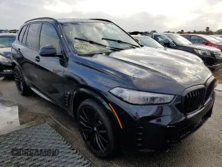2025 BMW X5 sDrive40i with VIN 5UX13EU05S9W56291, listed as a Copart auction lot 73857164 with 0 mi miles and Salvage Title. Bid and sale history available at carsss.com. Image 4.