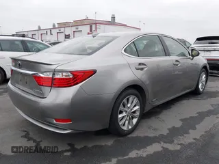 2015 Lexus ES 300h with VIN JTHBW1GG6F2093327, listed as a IAAI auction lot 42107023 with 102,502 mi miles and . Bid and sale history available at DreamBid. Image 4.
