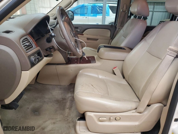 2014 Chevrolet Suburban LTZ with VIN 1GNSCKE0XER127997, listed as a Copart auction lot 42411525 with 228,690 mi miles and Salvage Title. Bid and sale history available at carsss.com. Image 7.