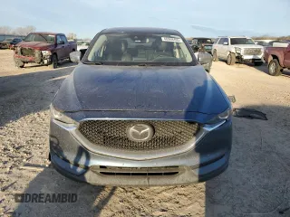 2020 Mazda CX-5 Touring with VIN JM3KFBCM9L0737243, listed as a Copart auction lot 46908495 with 76,956 mi miles and Salvage Title. Bid and sale history available at carsss.com. Image 5.