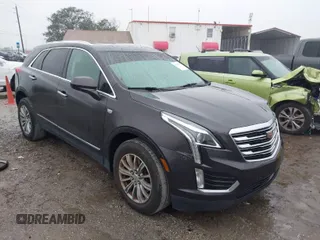 2017 Cadillac XT5 Luxury FWD with VIN 1GYKNBRS8HZ209286, listed as a IAAI auction lot 41405337 with 142,280 mi miles. Bid and sale history available at carsss.com. Image 1.