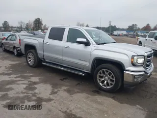 2017 GMC Sierra 1500 SLT z VIN 3GTU2NECXHG451794, wystawiony jako IAAI lot #40865850 z przebiegiem 243 866 mil mil oraz . Historia ofert i sprzedaży dostępna na DreamBid. Obrazek 1.
