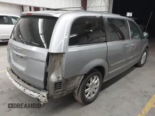 2013 Chrysler Town & Country Touring with VIN 2C4RC1BG7DR730420, listed as a IAAI auction lot 41911674 with 179,810 mi miles and . Bid and sale history available at DreamBid. Image 4.