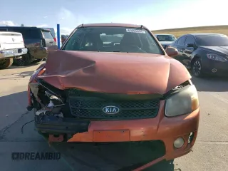 2007 Kia Spectra with VIN KNAFE162X75009714, listed as a Copart auction lot 69094894 with 206,173 mi miles and Salvage Title. Bid and sale history available at carsss.com. Image 5.