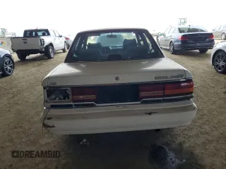 1991 Toyota Camry DLX z VIN 4T1SV21E1MU450315, wystawiony jako Copart lot #42772935 z przebiegiem 125 494 mil mil oraz Szkoda całkowita • Salvage title. Historia ofert i sprzedaży dostępna na DreamBid. Obrazek 6.