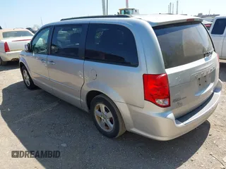 2012 Dodge Grand Caravan SXT with VIN 2C4RDGCG8CR139963, listed as a IAAI auction lot 42243745 with 185,730 mi miles and . Bid and sale history available at DreamBid. Image 3.