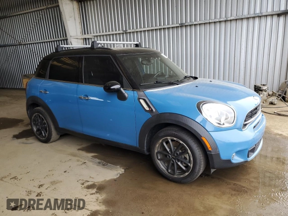 2016 MINI Countryman S with VIN WMWZC3C50GWT10905, listed as a Copart auction lot 47138895 with 59,649 mi miles and Salvage Title. Bid and sale history available at DreamBid. Image 4.