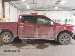 2015 Ford F-150 XLT with VIN 1FTEW1EG8FFA41398, listed as a IAAI auction lot 42102711 with 129,812 mi miles and . Bid and sale history available at DreamBid. Image 13.