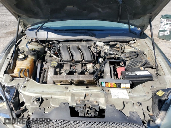 2004 Ford Taurus SE with VIN 1FAFP58S44A108250, listed as a Copart auction lot 58520615 with 119,575 mi miles and Salvage title. Bid and sale history available at DreamBid. Image 12.
