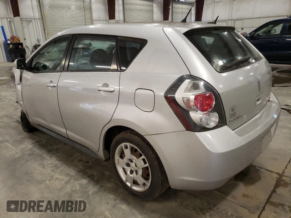 2010 Pontiac Vibe with VIN 5Y2SM6E03AZ403914, listed as a Copart auction lot 80558034 with 104,331 mi miles and Salvage Title. Bid and sale history available at carsss.com. Image 2.