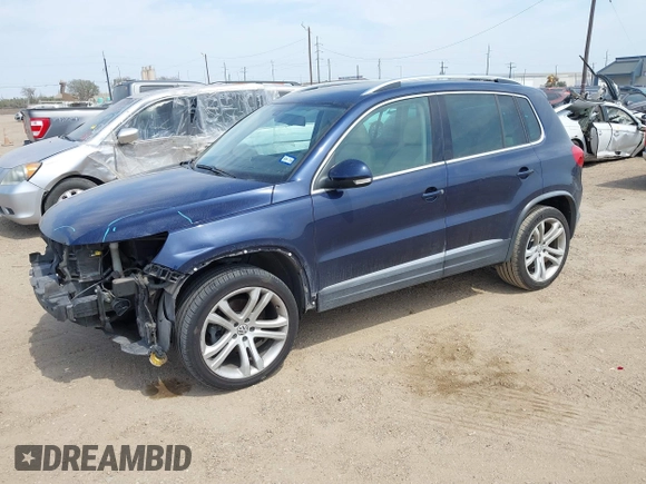 2012 Volkswagen Tiguan SEL with VIN WVGAV7AX8CW536752, listed as a IAAI auction lot 41798619 with 128,223 mi miles and . Bid and sale history available at DreamBid. Image 17.