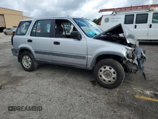 2001 Honda CR-V LX z VIN JHLRD284X1S002698, wystawiony jako Copart lot #56597825 z przebiegiem 254 762 mil mil oraz Szkoda całkowita • Salvage title. Historia ofert i sprzedaży dostępna na DreamBid. Obrazek 4.