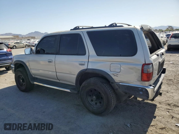 1999 Toyota 4Runner SR5 with VIN JT3GN86R4X0099618, listed as a Copart auction lot 58204145 with 297,759 mi miles and Salvage title. Bid and sale history available at DreamBid. Image 2.
