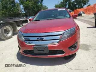 2012 Ford Fusion SE z VIN 3FAHP0HG0CR421694, wystawiony jako Copart lot #57179145 z przebiegiem 208 731 mil mil oraz Czysty tytuł • Clean title. Historia ofert i sprzedaży dostępna na DreamBid. Obrazek 5.