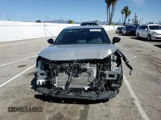 2025 Honda Civic Sport z VIN 2HGFE2F56SH502604, wystawiony jako Copart lot #49103395 z przebiegiem Nie podano mil oraz Szkoda całkowita • Salvage title. Historia ofert i sprzedaży dostępna na DreamBid. Obrazek 10.