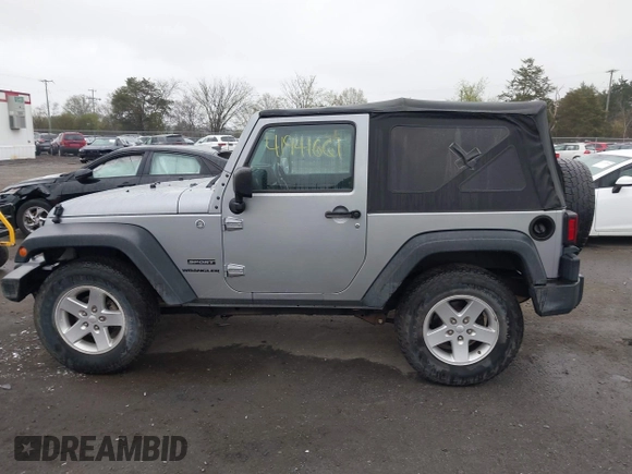 2015 Jeep Wrangler Sport with VIN 1C4AJWAG6FL501160, listed as a IAAI auction lot 41941661 with 134,842 mi miles. Bid and sale history available at carsss.com. Image 14.