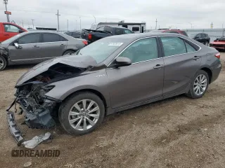 2015 Toyota Camry LE z VIN 4T1BD1FK7FU166007, wystawiony jako Copart lot #57523615 z przebiegiem Nie podano mil oraz Szkoda całkowita • Salvage title. Historia ofert i sprzedaży dostępna na DreamBid. Obrazek 1.