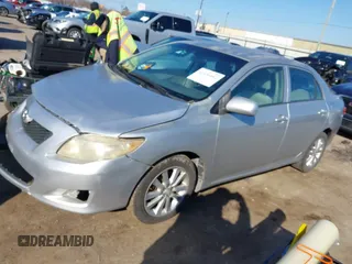 2009 Toyota Corolla with VIN JTDBL40E999021621, listed as a IAAI auction lot 41636462 with 123,650 mi miles. Bid and sale history available at carsss.com. Image 17.