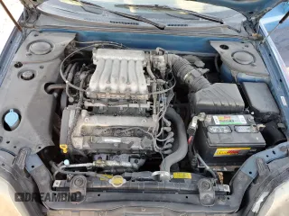 2005 Hyundai Tiburon GT z VIN KMHHN65F35U186438, wystawiony jako Copart lot #41879955 z przebiegiem 152 574 mil mil oraz Szkoda całkowita • Salvage title. Historia ofert i sprzedaży dostępna na DreamBid. Obrazek 11.