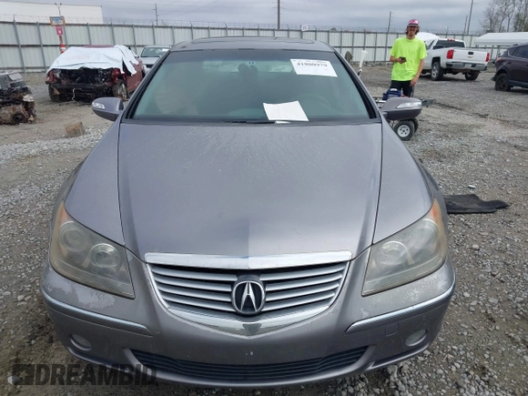 2005 Acura RL z VIN JH4KB16525C006978, wystawiony jako IAAI lot #41800979 z przebiegiem 213 501 mil mil oraz . Historia ofert i sprzedaży dostępna na DreamBid. Obrazek 12.