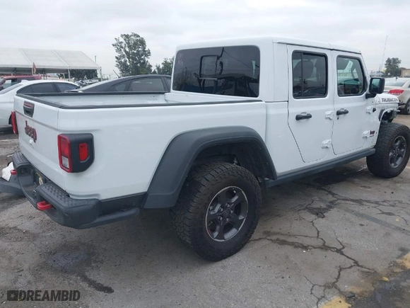2022 Jeep Gladiator Rubicon with VIN 1C6JJTBG9NL113990, listed as a IAAI auction lot 38583176 with 31,520 mi miles. Bid and sale history available at carsss.com. Image 4.