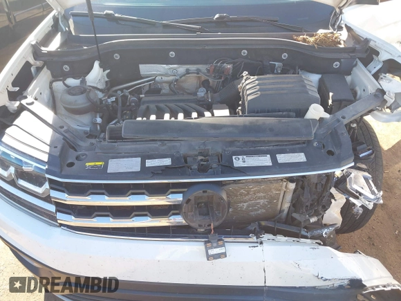2018 Volkswagen Atlas SEL z VIN 1V2MR2CA3JC536009, wystawiony jako IAAI lot #40205798 z przebiegiem 125 945 mil mil oraz . Historia ofert i sprzedaży dostępna na DreamBid. Obrazek 10.