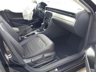 2020 Volkswagen Passat 2.0T SE with VIN 1VWWA7A30LC013193, listed as a IAAI auction lot 42127722 with 55,963 mi miles. Bid and sale history available at carsss.com. Image 5.