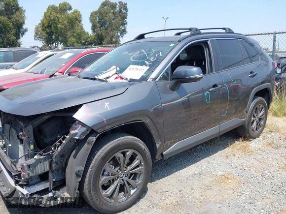 2023 Toyota RAV4 Hybrid XLE Premium with VIN 4T3B6RFV9PU117919, listed as a IAAI auction lot 42528322 with 27,236 mi miles and . Bid and sale history available at DreamBid. Image 22.