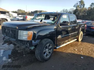 2010 GMC Sierra 1500 SLT with VIN 3GTRKWE3XAG282913, listed as a Copart auction lot 89388735 with 203,618 mi miles and Salvage Title. Bid and sale history available at carsss.com. Image 1.
