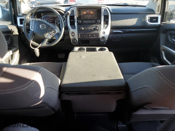 2021 Nissan Titan S with VIN 1N6AA1EC2MN528946, listed as a Copart auction lot 81486324 with 62,521 mi miles and Salvage title. Bid and sale history available at DreamBid. Image 8.