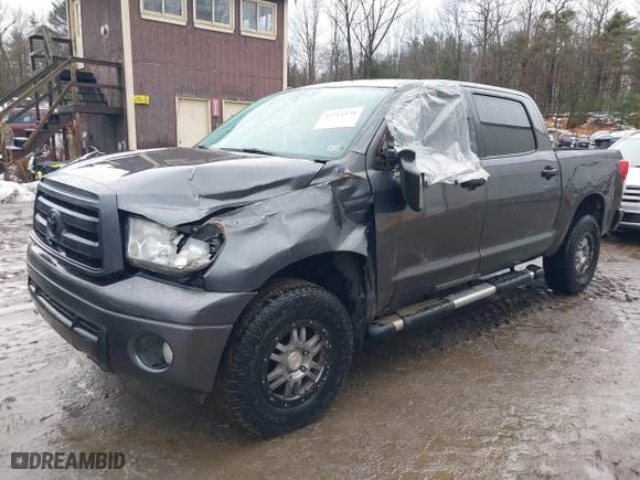 2013 Toyota Tundra 4WD Truck with VIN 5TFDY5F18DX309798, listed as a IAAI auction lot 41711578 with 123,642 mi miles. Bid and sale history available at carsss.com. Image 2.