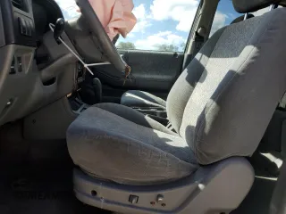 2002 Isuzu Rodeo S with VIN 4S2CK58W124322241, listed as a Copart auction lot 79009994 with 131,793 mi miles and Salvage Title. Bid and sale history available at DreamBid. Image 7.