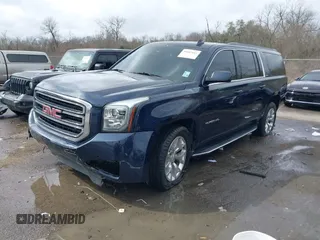 2017 GMC Yukon XL SLT with VIN 1GKS1GKC0HR319058, listed as a IAAI auction lot 41667612 with 116,695 mi miles and . Bid and sale history available at carsss.com. Image 2.