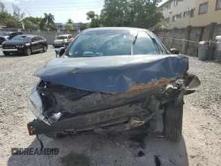 2010 Toyota Corolla with VIN 1NXBU4EE9AZ350774, listed as a Copart auction lot 52951795 with 123,800 mi miles and Non Repairable. Bid and sale history available at carsss.com. Image 5.