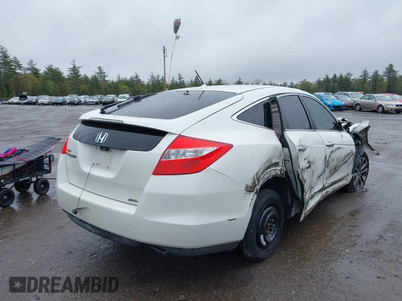 2010 Honda Crosstour EX-L z VIN 5J6TF2H55AL010444, wystawiony jako IAAI lot #42187788 z przebiegiem 217 940 mil mil oraz . Historia ofert i sprzedaży dostępna na DreamBid. Obrazek 4.