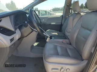 2015 Toyota Sienna XLE with VIN 5TDYK3DC7FS630252, listed as a Copart auction lot 65182965 with 90,764 mi miles and Salvage title. Bid and sale history available at DreamBid. Image 7.