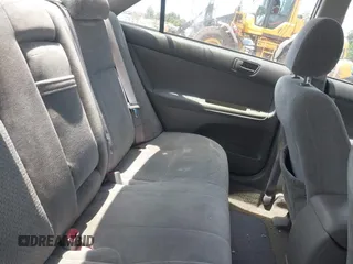 2004 Toyota Camry LE z VIN 4T1BE32K64U881677, wystawiony jako IAAI lot #42388247 z przebiegiem 173 550 mil mil oraz . Historia ofert i sprzedaży dostępna na DreamBid. Obrazek 8.