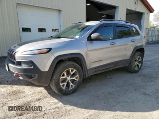 2017 Jeep Cherokee Trailhawk L Plus with VIN 1C4PJMBS0HD214427, listed as a Copart auction lot 57035035 with 123,957 mi miles and Salvage title. Bid and sale history available at DreamBid. Image 1.