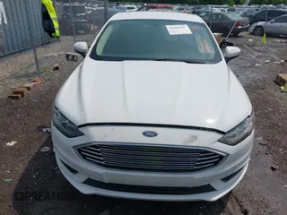 2017 Ford Fusion SE z VIN 3FA6P0HD7HR309432, wystawiony jako IAAI lot #42163947 z przebiegiem 201 575 mil mil oraz . Historia ofert i sprzedaży dostępna na DreamBid. Obrazek 12.