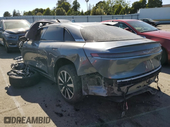 2023 Lucid Air Pure z VIN 50EA1PFA6PA006296, wystawiony jako Copart lot #52593944 z przebiegiem Nie podano mil oraz Szkody całkowita. Historia ofert i sprzedaży dostępna na DreamBid. Obrazek 2.