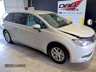 2017 Chrysler Pacifica Touring with VIN 2C4RC1DG5HR764942, listed as a IAAI auction lot 42255421 with 64,381 mi miles and . Bid and sale history available at DreamBid. Image 7.