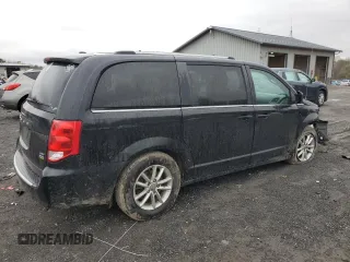 2019 Dodge Grand Caravan SXT with VIN 2C4RDGCG4KR580424, listed as a Copart auction lot 52715245 with 130,696 mi miles and Salvage Title. Bid and sale history available at DreamBid. Image 3.