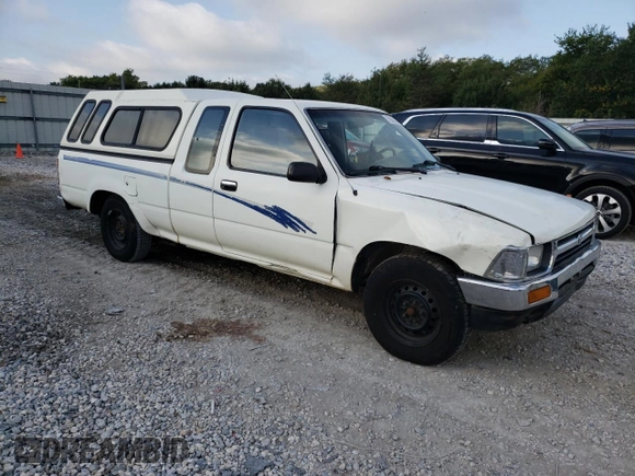 1993 Toyota Pickup DLX z VIN JT4RN93P7P5074129, wystawiony jako Copart lot #72893054 z przebiegiem 235 053 mil mil oraz Szkoda całkowita • Salvage title. Historia ofert i sprzedaży dostępna na DreamBid. Obrazek 4.