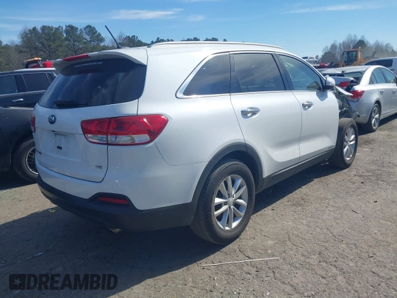 2018 Kia Sorento LX V6 with VIN 5XYPGDA57JG371874, listed as a IAAI auction lot 41668457 with 130,022 mi miles. Bid and sale history available at carsss.com. Image 4.