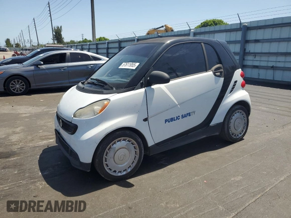 2014 Smart fortwo Pure with VIN WMEEJ3BAXEK778748, listed as a Copart auction lot 57611955 with 59,895 mi miles and Clean title. Bid and sale history available at DreamBid. Image 1.