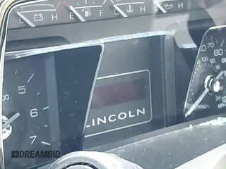 2012 Lincoln Navigator z VIN 5LMJJ2J50CEL05330, wystawiony jako IAAI lot #41243003 z przebiegiem Nie podano mil oraz . Historia ofert i sprzedaży dostępna na DreamBid. Obrazek 7.