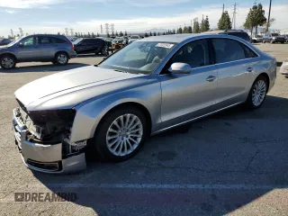 2015 Audi A8 L 4.0T with VIN WAU32AFD6FN039126, listed as a Copart auction lot 47020945 with 137,133 mi miles and Salvage Title. Bid and sale history available at carsss.com. Image 1.