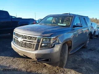2019 Chevrolet Tahoe LT with VIN 1GNSCBKC8KR123828, listed as a IAAI auction lot 41256573 with 125,618 mi miles. Bid and sale history available at carsss.com. Image 2.