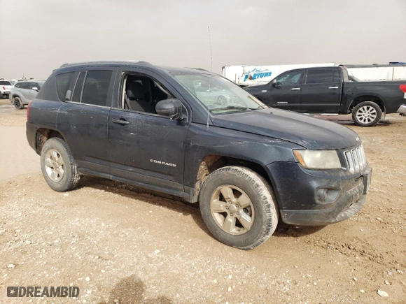 2014 Jeep Compass Sport with VIN 1C4NJCBA6ED573849, listed as a Copart auction lot 47001505 with 259,846 mi miles and Salvage Title. Bid and sale history available at carsss.com. Image 4.